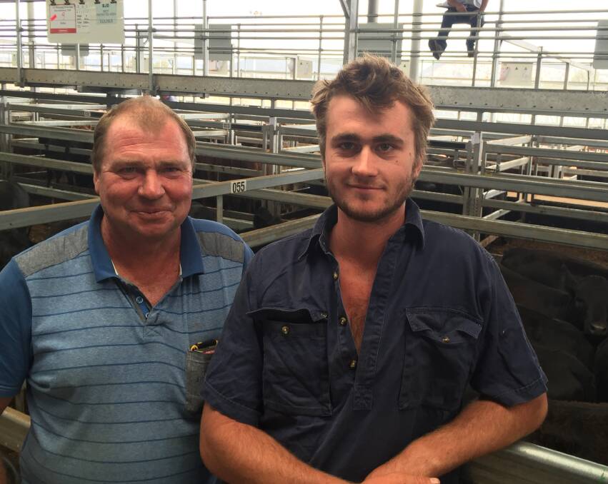Peter (left) and Matt Calvin, Holbrook, sold 43 Angus-Limousin heifers at Wodonga from $955-$1100, or 308.5c/kg lwt. Peter was very pleased with their sale.