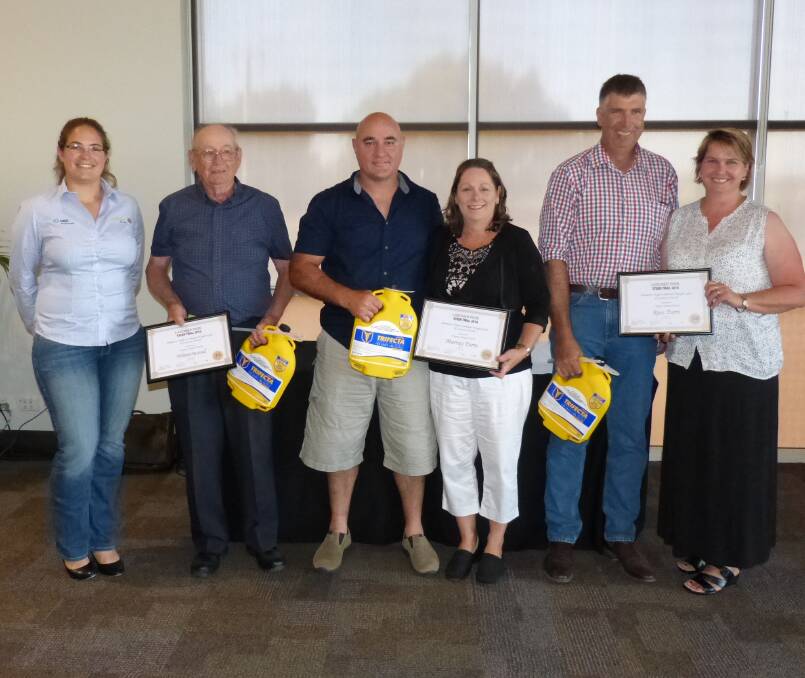 Alice Peillon presents the highest carcase points to placegetters (from left)  Peter Hutchinson (1st), John and Tracey Murray (2nd) and Brad and Gale Ross (3rd).