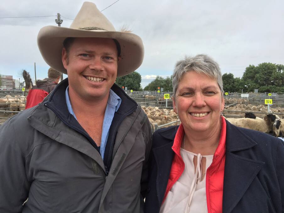 SOLID GAINS: Ryan Hussey from Rodwells Wangaratta with Marlene Croxford-Demasi from Mansfield sold 270 new season lambs to a top of $174.00. Lamb prices are hitting record levels for those new season spring lambs.