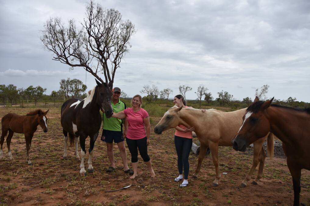 Mark and Kellie Lalor, with Bobbi Austin and their horses at Kings Gully Park, near Charters Towers.