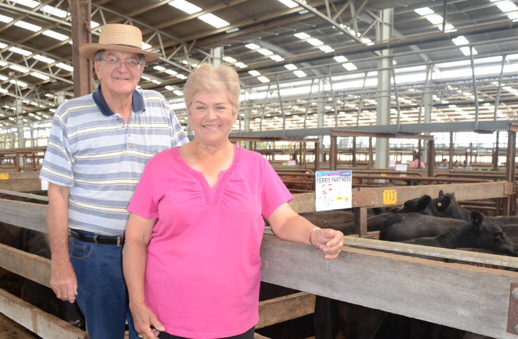 WELL PLEASED: Geoff Ferris and his wife Athalee, Keilira, were happy sellers. Their heifers topped at $1240, for a line of 27 weighing 326kg. Their steers sold to $1439 and averaged $1360.