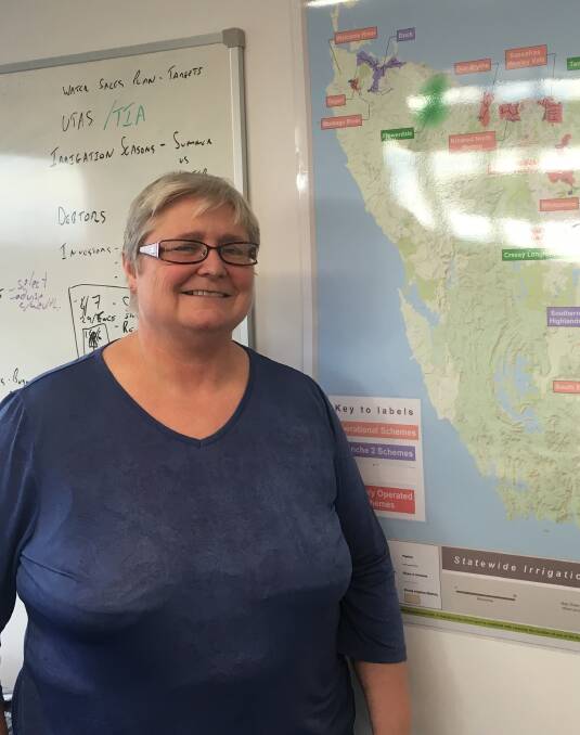 WATER SECURITY: Tasmanian Irrigation's Nicola Morris with a map of the irrigation schemes open and under way across the state. Picture: Caitlin Jarvis.