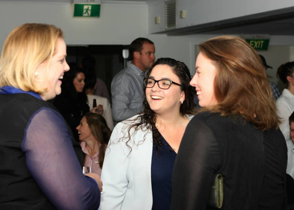 Angus representative Ashleigh Horne, Armidale (centre), chats with Meg Bell, Coleraine, Victoria and Hannah Bourke, Armidale, both representing Herefords.