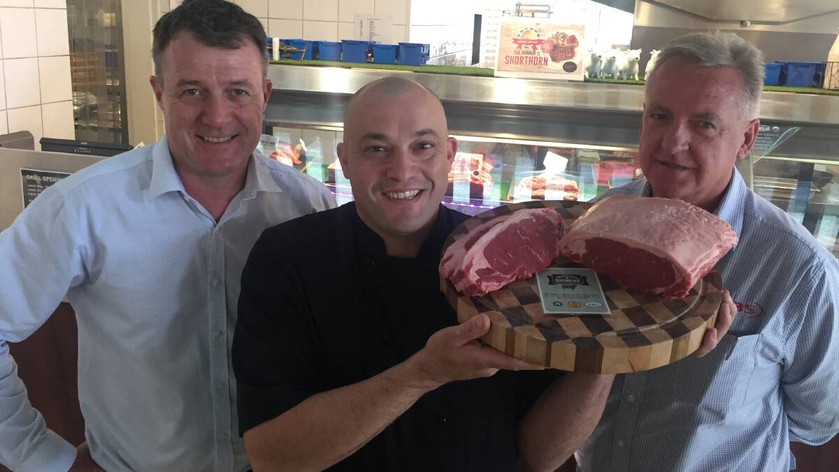 Norman Hotel manager Andrew Ford, Norman Hotel executive chef Frank Correnti, and Denis Conroy, JBS, with the winning Shorthorn Thousand Guineas sirloin.