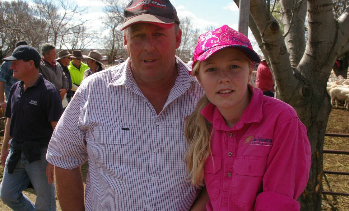 Ardlethan, NSW, cropper Neil Morris, pictured with daughter Emma, paid $265 a head for the Mooloomoon ewes in the opening pen at Hay, NSW.