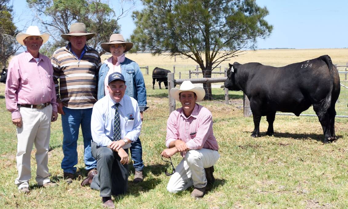 QLD PICK: Lancaster's Tim Cartledge with $12,500 top bull buyers Steve and Robyn White, Roma, Qld, Spence Dix & Co's Mark O'Leary and Lancaster's Henry Cartledge.