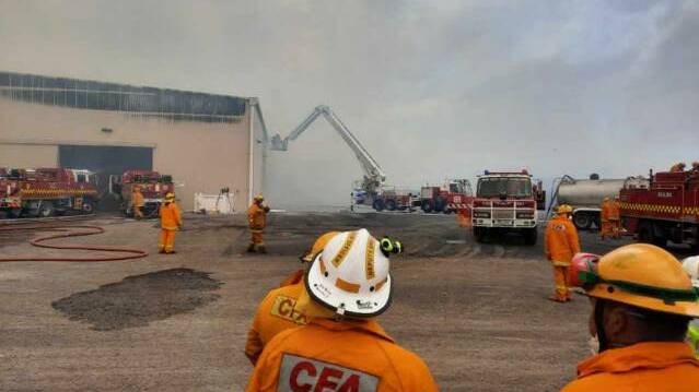 SCENE: CFA crews at the large shed fire on Sunday. Photos contributed.