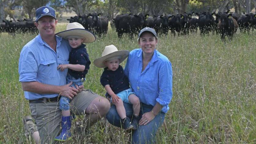 Hamish and Jess Webb, with children Walter and Angus, are eager to explore the potential of their Uralla property, Myanbah's soil.