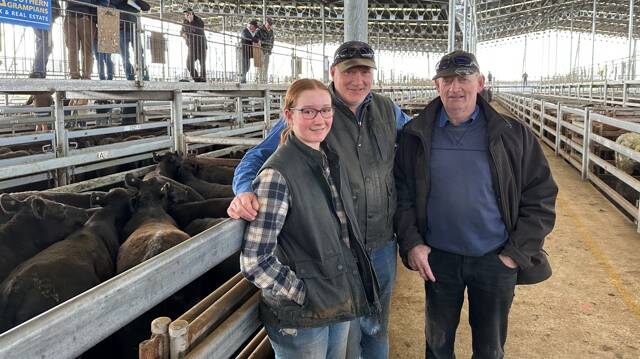 Zoe, Damian and Peter Wines, who run Purleigh at Garvoc and Windy View at Cooriemungle. 46 Angus steers from their Cooriemungle property, weighing 502kg were sold for 268c/kg, or $1348, while their 12 Angus steers from Purleigh in Garvoc, weighing 505kg reached 265c/kg or $1339ph. Picture supplied.