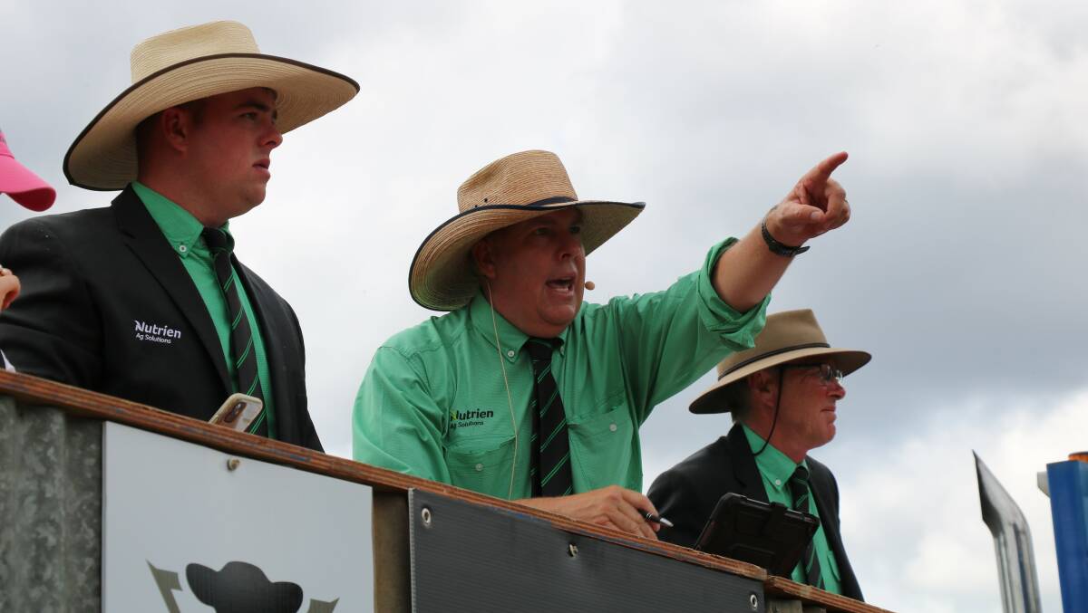 SALE-O: Nutrien agents Cooper Lamprey, auctioneer Warren Johnston and Jock Gibson at the 44th on-property Landfall Angus sale. 