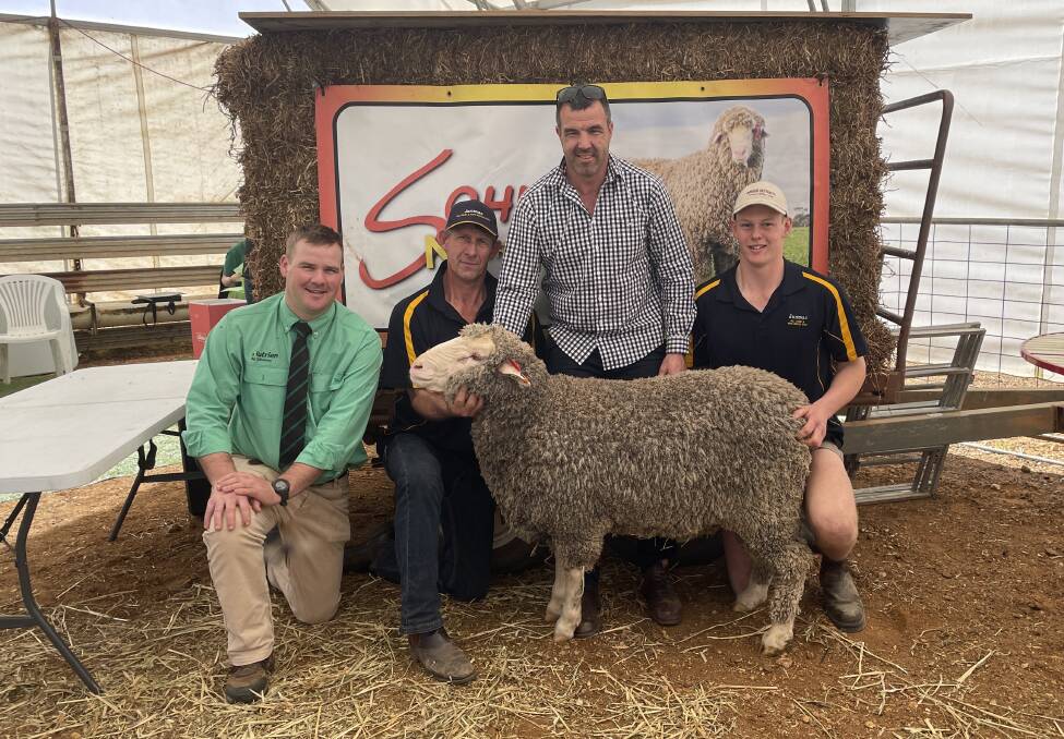 Nutrien Victorian stud stock agent Nick Farley with buyers Carl and Grant Hausler, Janmac Pastoral, Goroke and Sohnic stud principal Scott Nicholson, Marnoo East with with top priced ram, Lot 10 Sohnic 221056 sold for $4500.
