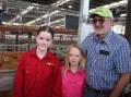 Colac buyers Chris Meade, with Zahra, 12 and Molly, 8, Meade were "looking for some Limousin females" and did buy a Innisfail's pen of 27 Limousin heifers, 304kg, for 424c/kg or $1288.