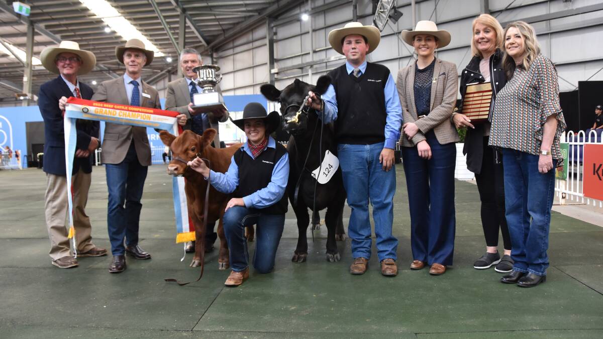 Melbourne Royal Beef Cattle Competition Committee chair David Bolton, Royal Show CEO Brad Jenkins, committee member Gary Turnham, handlers Carlie Machelmann and Matt Cooney, judge Aimee Bolton, NH Foods, Toowoomba, Jane Ristrom, Elandra Park, Red Hill and Vicki Gilbert, Rotherwood, Tallygaroopna with supreme exhibit Rotherwood Precious Girl.