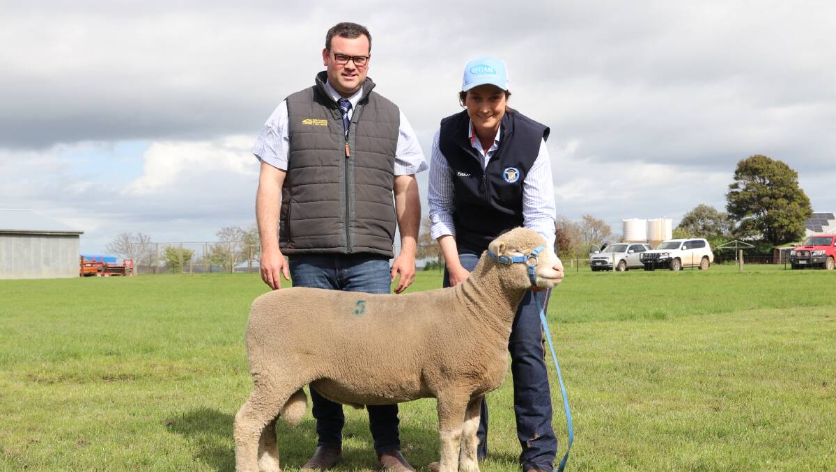 Lachie & Anna Charlton, May Mark Poll Dorsets, SomertonNSW purchased the top price ram, Lot 5, Estjam-210108. Blair OToole from Southern Grampian Livestock is here with Estjam stud principal Esther Glasgow, Woolsthorpe. Picture supplied.
