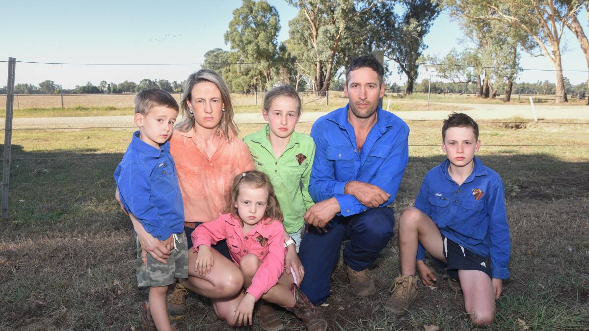 John Conroy, Bobinawarrah, with Will (4), Jess, Isla (6), Anna (8), and Jack (10) Conroy. Mr Conroy said a proposed solar farm in his region will have detrimental effects on insurance costs. Picture by Kurt Hickling.
