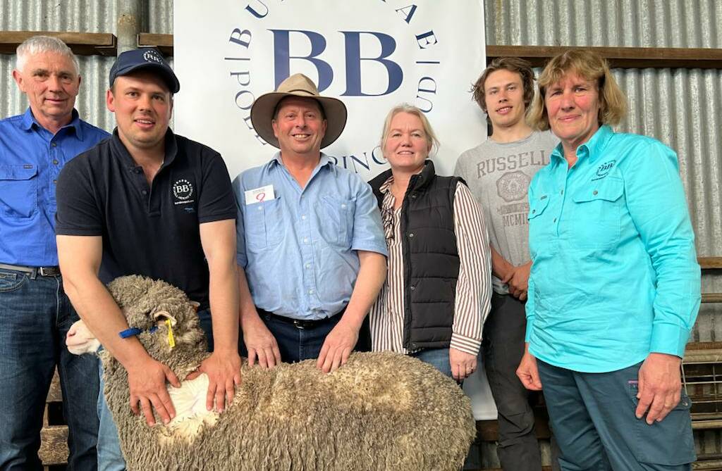 Burnbrae Poll Merino stud principals Alan and Steven Wishart, Inverleigh, with Chris and Katrina Bruty, Homelea, Mount Emu with Hamish and Janine Wishart, also representing Burnbrae stud with top priced ram Lot 66, Tag 210005. Picture supplied.