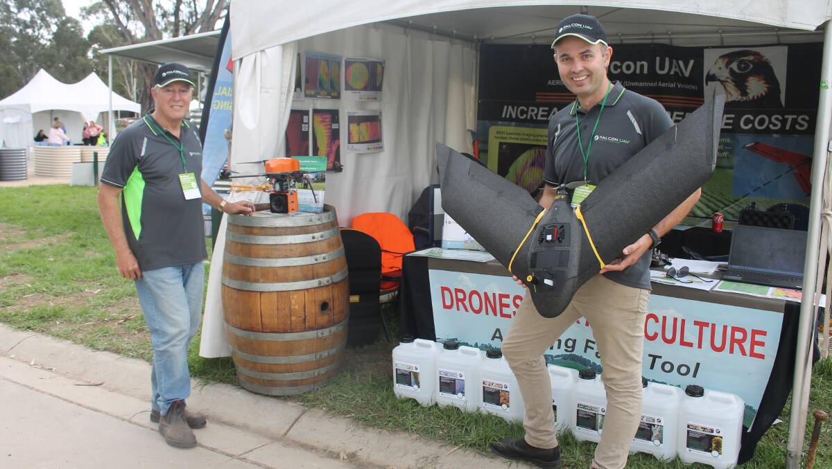 Chief pilot for drone manufacturer Falcon UAV Phil Lyons and owner of Falcon UAV Luke Weekley demonstrating models at the Seymour Alternative Farming Expo. Picture by Philippe Perez