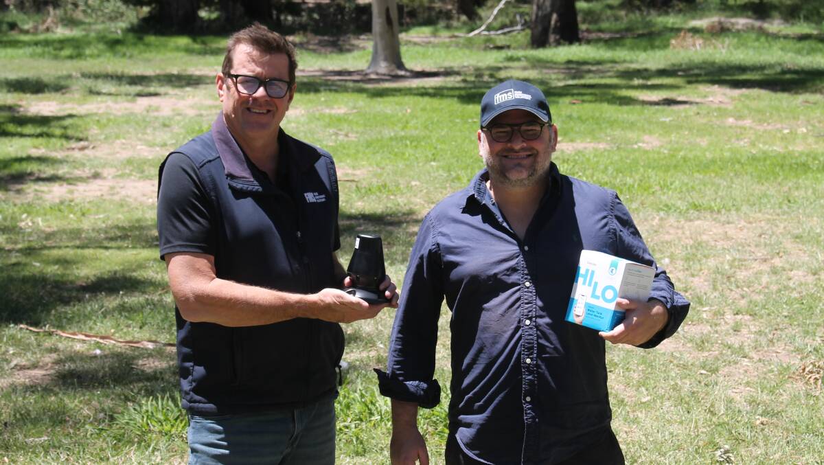Farm Monitoring Solutions owner Phil Whitton and Farm Monitoring Solutions marketing and sales manager Josh Mellor with a HiLo water level monitor. Mr Witton said more farmers are becoming more reliant on specific data on properties regarding weather. Picture by Philippe Perez