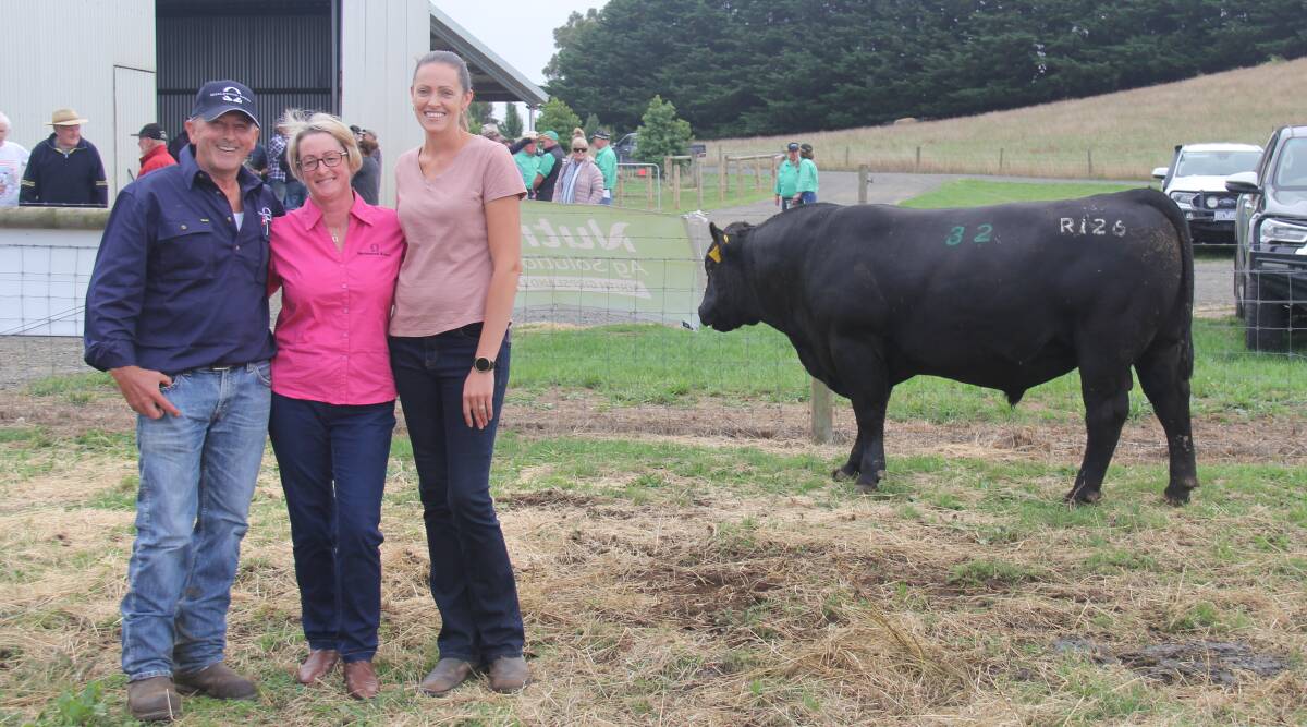 HAPPY BUYER: Merlewood Angus stud principals Daniel and Anne Marie Barrow with client Nicole White, Bairnsdale, who bought the top-priced bull - Lot 32, Merlewood Up River R126, for $17,000 at their sixth annual bull sale.