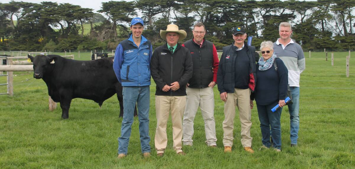 Banquet Angus' Hamish Branson with Peter Godbolt, Nutrien, Ross Milne, Elders, and purchasers of the top-priced bull Londavra stud co-principals David and Vivienne Young, St Marys, Tas with Damon Young. Lot 4 Banquet Top Deck T020 sold for $42,000. Picture by Philippe Perez