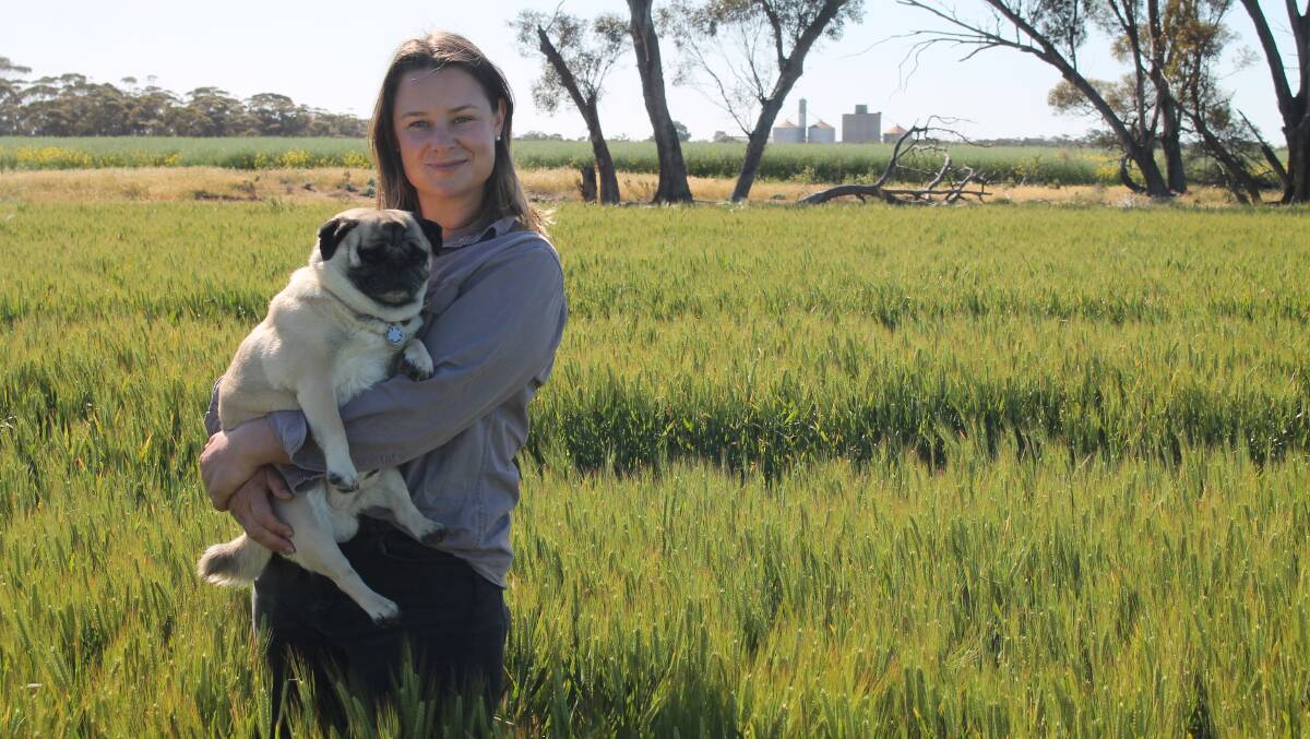 Georgina Warne, with pup Walter, Culgoa, says a good amount of subsoil moisture still remains on her property despite conditions drying out. Picture by Philippe Perez