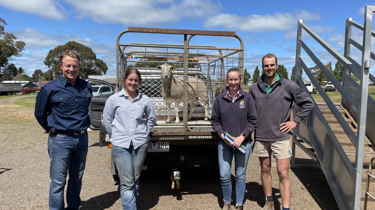 Yarram Park property manager Craig Brewin and stud manager Georgia Walter, Lucindale, SA with Maddy Goldsworthy and Trent Williamson, Mortlake with top priced ram Lot 46. Picture by Philippe Perez 