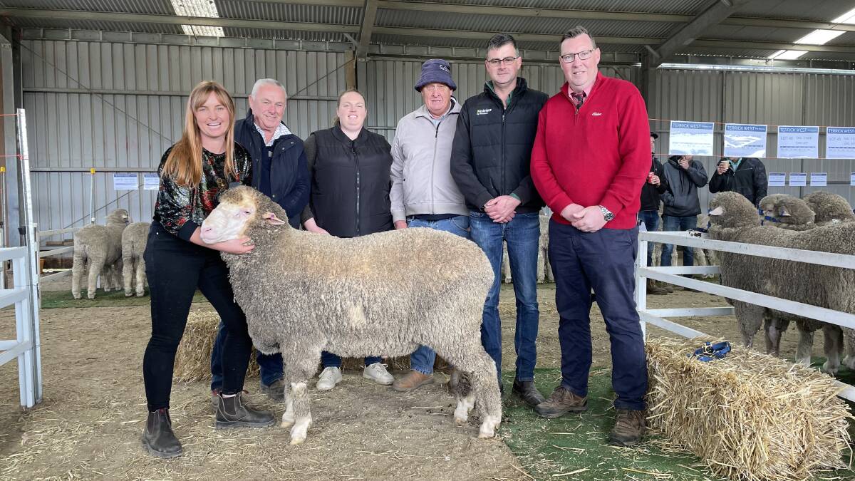SALE: Terrick West Poll co-stud principals Claire and Ross McGauchie, buyers Ellie Perryman and Ian Klowss, Oaklands Vectis with their top-priced ram Lot 9 210208, which sold for $6500, with Nutrien Horsham's Roly Coutts and Elders stud stock manager Victoria Riverina Ross Milne.