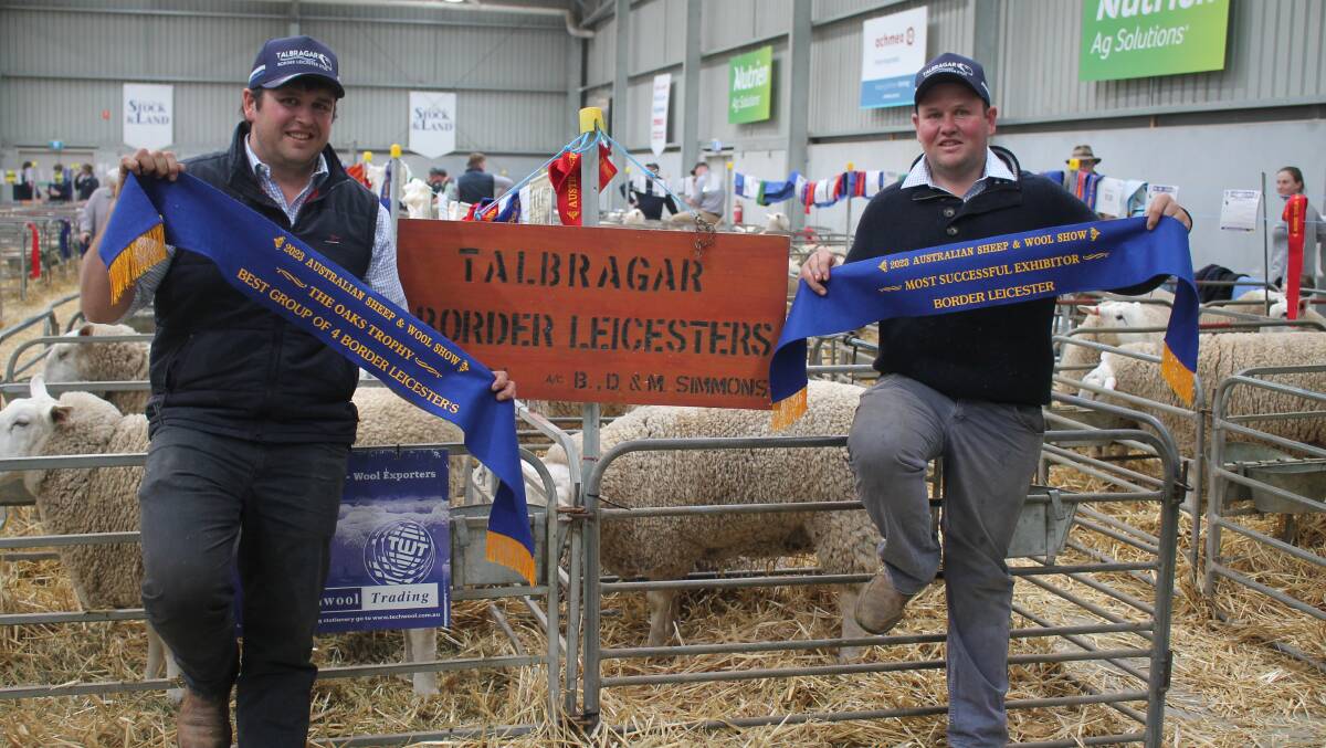 Ben and Daniel Simmons, Talbragar, Dunedoo, NSW celebrating being awarded the most successful exhibit in the Border Leicester competition at ASWS 2023. Picture by Philippe Perez