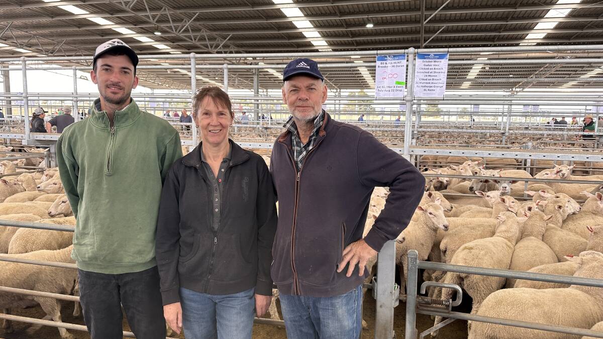 Fraser, Ann and Daryl Hunt, Mount Doran, consigned 370 ewes at the recent Ballarat first-cross ewe sale last week with 200 of them selling for $132. Daryl said recent rain meant there was a "positive outlook" in the sheep sector. Picture by Philippe Perez 