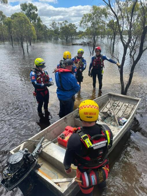 Firefighters rescue team at flooded paddocks in Barham rescuing goats. Picture Supplied
