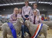 WINNERS: Narrandera High School, NSW, team of Hannah, Sophie, Clare, Natalie and Maddie with their champion buck and grand champion Angora goat.