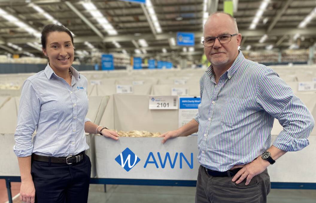 Success: Australian Wool Network wool technical officer/auctioneer Cassie Baile and Michael Manion Wool Industry Foundation director Peter Brice.