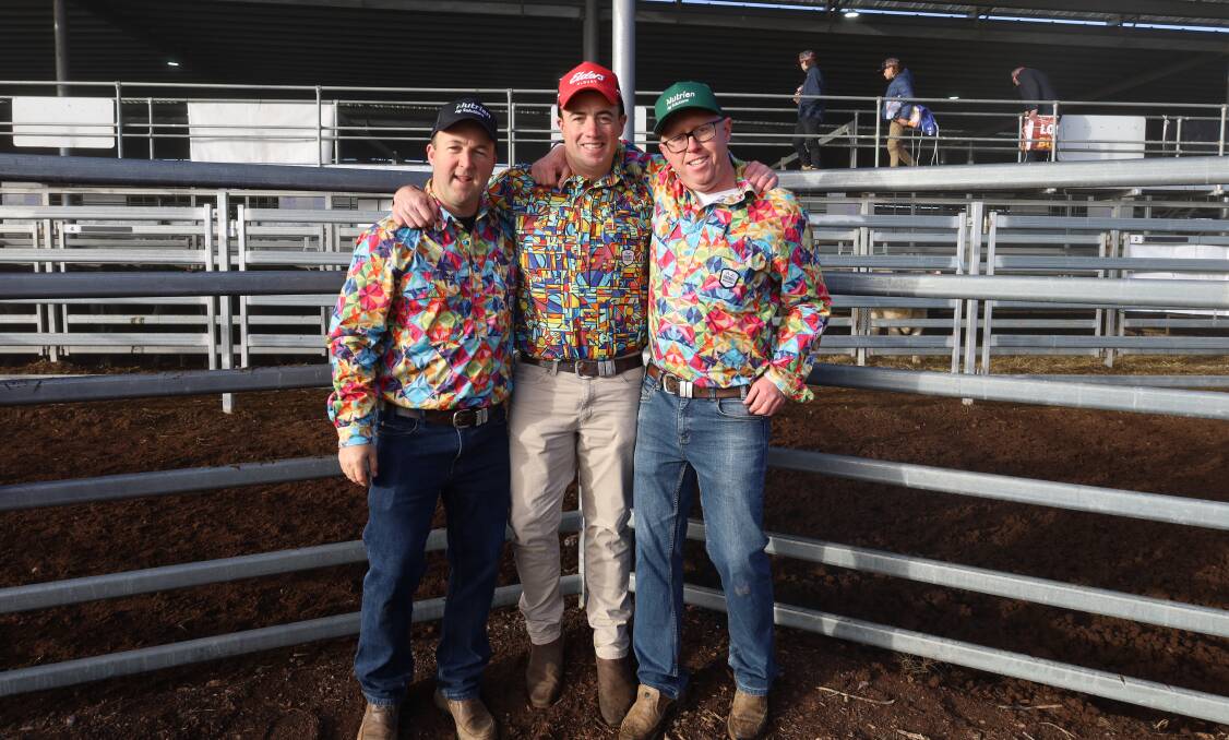 Luke Deimel, co-branch manager Paull and Scollard Nutrien, with Brett Shea, Elders livestock manager, and fellow PSN branch manager Tim Robinson wearing Trade Mutt This Is A Conversation Starter shirts to raise awareness for mental health. Picture by Elle Locke, Elders. 
