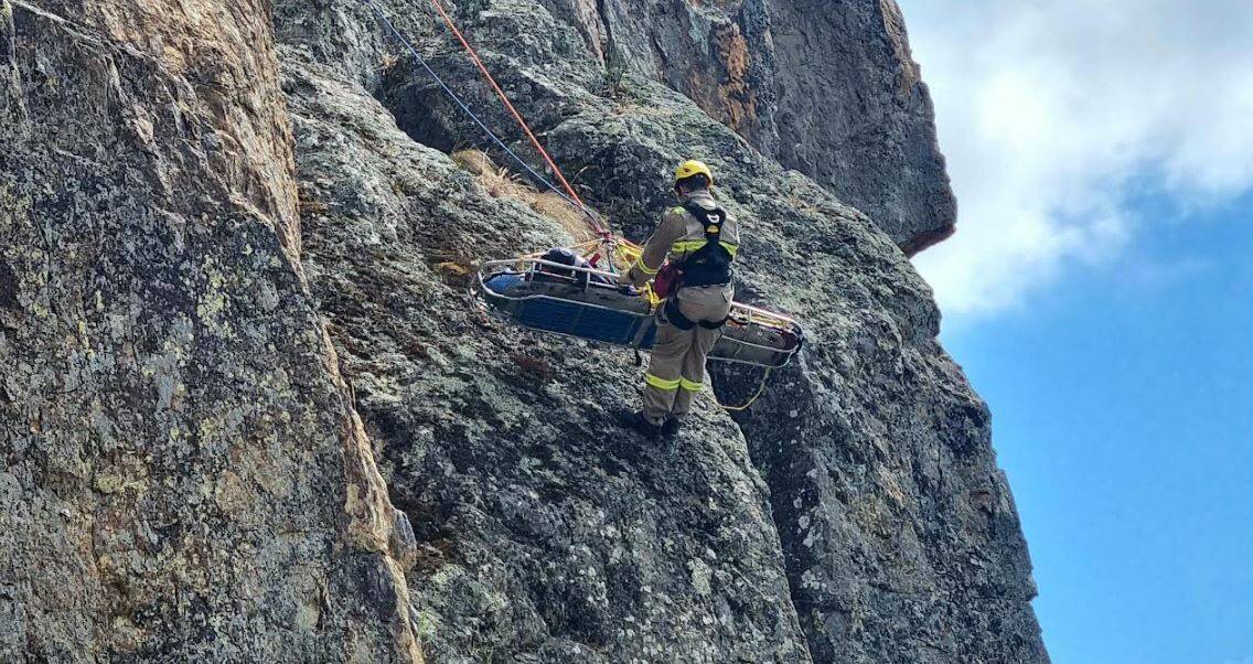 An firefighter hangs on for dear life at Werribee Gorge State Park. 