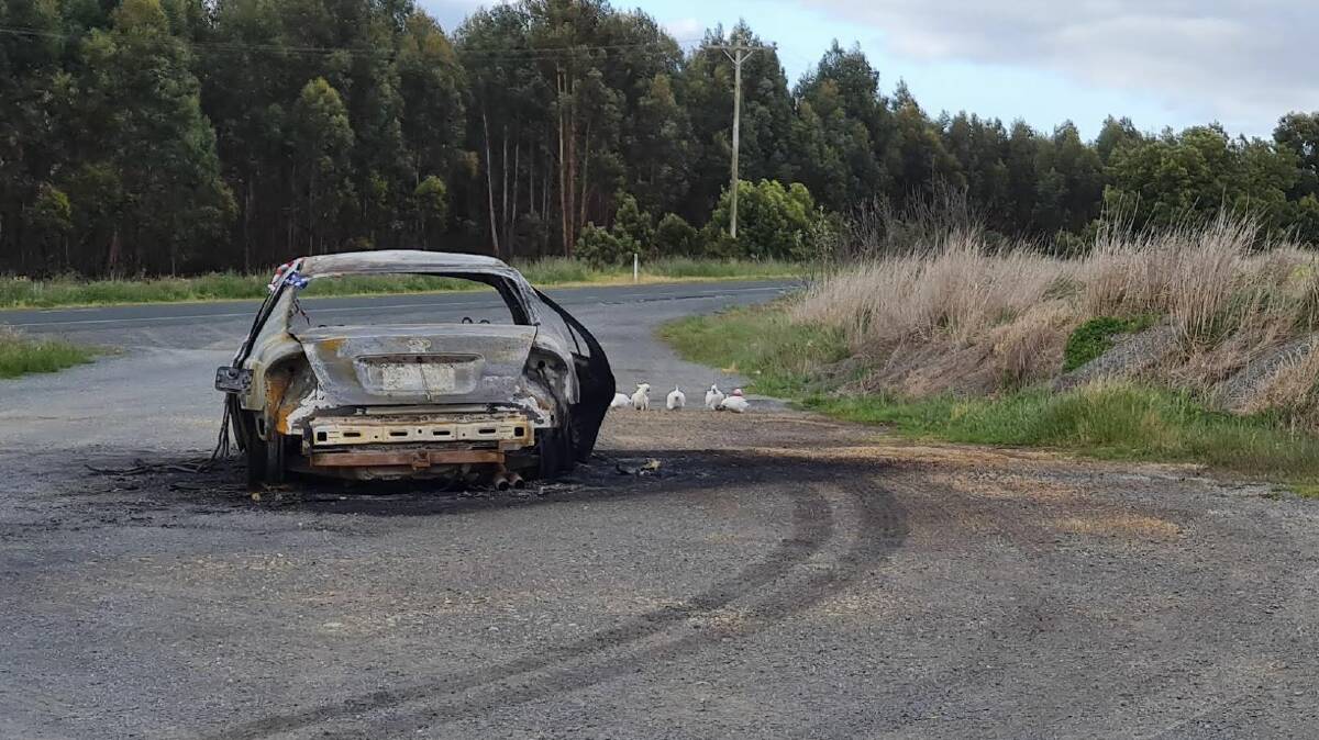 This 2003 Ford Falcon was unrecognisable after it was found torched on Geelong-Ballan Road on October 16. Picture by Gabrielle Hodson.