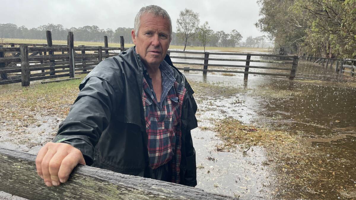 The Fringe Merino stud principal John Freeman, Briagalong, is about 20 kilometres from the active Briagolong bushfire and is moving stock amid heavy rain. Picture by Bryce Eishold