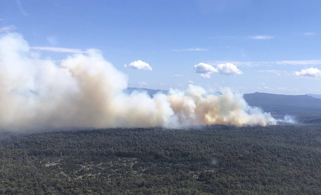 An uncontrolled fire at Bradys Lake, Tasmania, is threatening nearby homes and residents, who were issued a warning to seek shelter immediately. Picture supplied