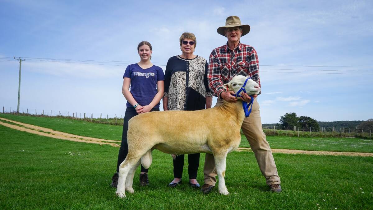 Imogen, Christine and Maurice Baldock with this year's Suffolk/White Suffolk supreme champion for the Elite Show & Sale. Picture by Rachel Simmonds