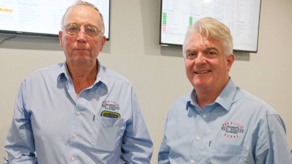 Fox & Lillie broker and Warrenbayne farmer John Harrison said weather conditions and farm costs were significant challenges in the past 12 months. He is pictured with Fox & Lillie brokerage manager and wool technical manager Eamon Timms. Picture by Rachel Simmonds