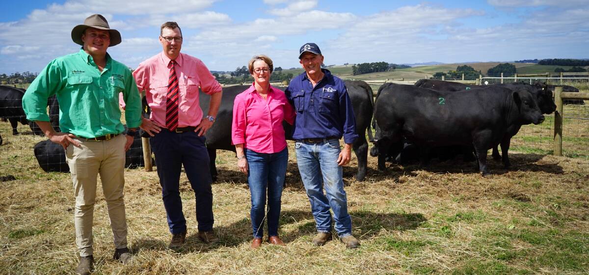 Merlewood Angus sold its top bull Lot 2, Merlewood Capitalist S24, for $24,000. Nutrien SGL agent Jack Ginnane, Elders auctioneer Ross Milne and Merlewood stud principals Anne-Marie and Daniel Barrow. Picture by Rachel Simmonds