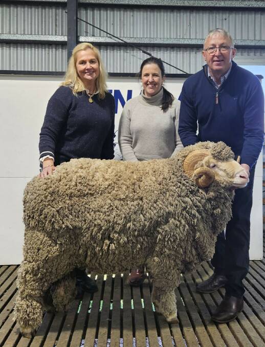 Kathy Mibus, Anna Cotton, and Trevor Mibus, with Lot 1. Picture supplied