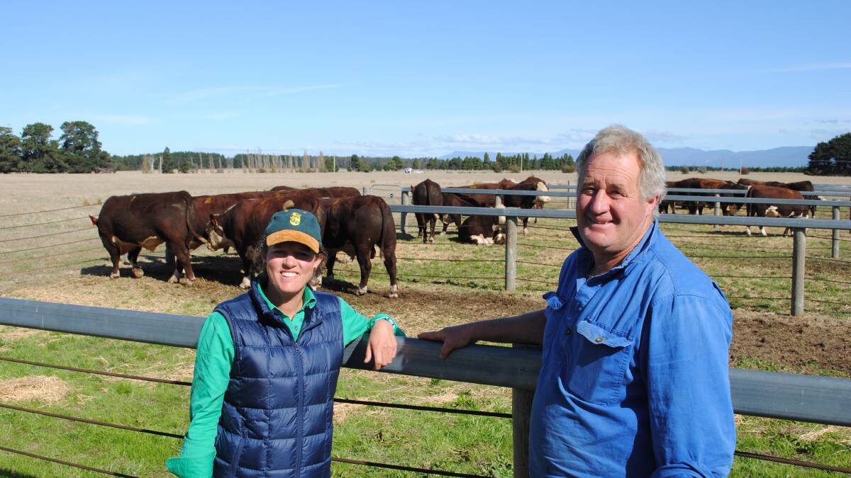 Quamby Plains Poll Hereford stud principal Victoria Archer with the buyer of four of her bulls, William Fergusson, Triabunna, Tasmania. Picture by Barry Murphy 