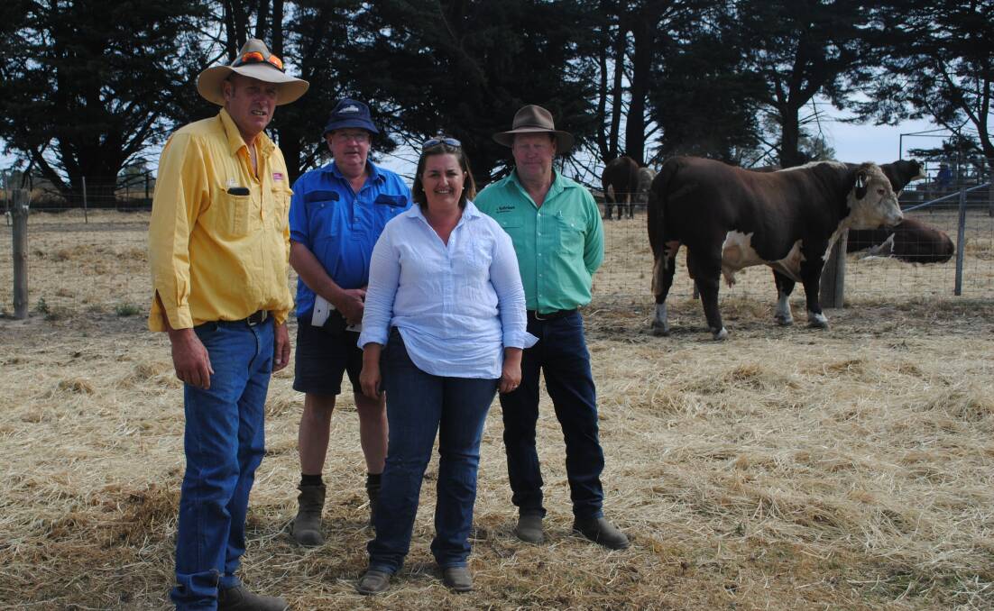 Wilkah Herefords stud principal David Lyons, Vasey, with repeat customer Ian Murphy, Carapook, his wife Angela Lyons, Vasey, and Mr Murphy's agent Andrew Harrison, Carapook. Picture by Barry Murphy 