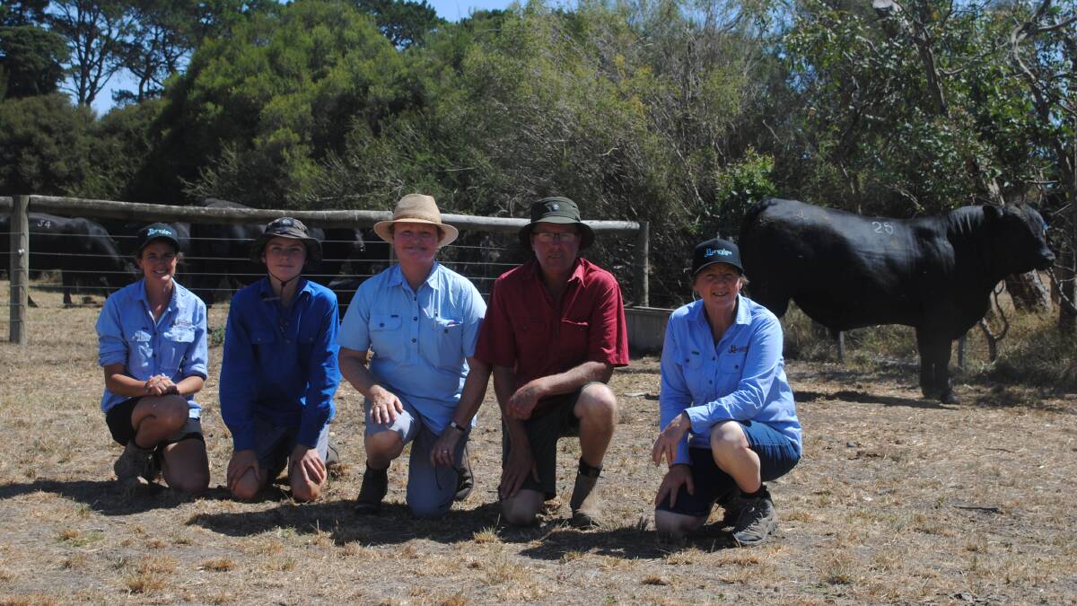 Barwidgee Angus stud principal Wendy Kelly, Caramut with farm manager Chantel Bambridge, Hexham and buyers of the second highest priced bull at the sale, Andrew and Anne Dwyer, Hawkesdale and their son Jordan (14). Picture by Barry Murphy 