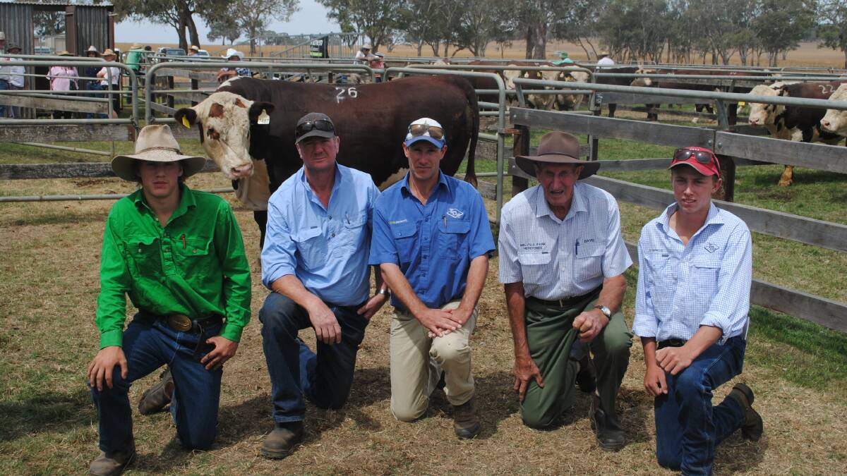 Melville Park Hereford stud principal David Lyons, Vasey, with buyer of his top-priced bull, Trent Morris, south Hamilton, agents Guy Robertson and Jack Austin, Coleraine and farm hand Kaidyn Roberts, Vasey. Picture by Barry Murphy 