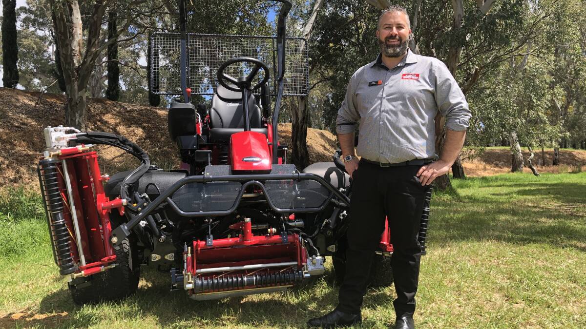 ON THE GREEN: Kubota golf and turf equipment sales executive Trent Saunders with the new Baroness LM551 mower.