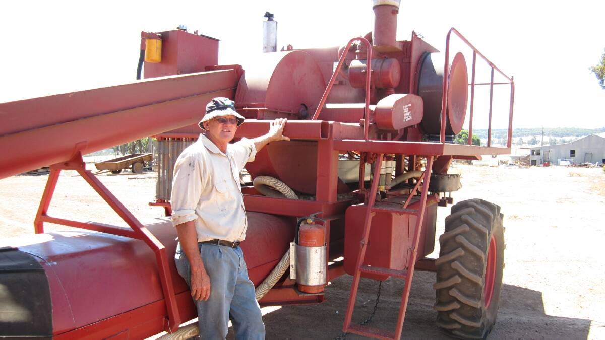 FARMER INVENTOR: WA farmer and inventor Ray Harrington with the original Harrington Weed Destructor he built in 1996.