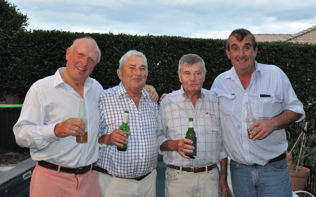 MATES: Recalling the halcyon days of the Moore Park Showgrounds with a couple of beers - John Atkins, Ashley Dingle, David Marshall and John Collier. Photo by Donna Marshall.