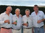 MATES: Recalling the halcyon days of the Moore Park Showgrounds with a couple of beers - John Atkins, Ashley Dingle, David Marshall and John Collier. Photo by Donna Marshall.