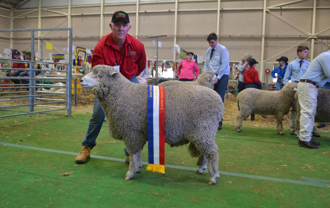 Ric Houlahan, Glen Esk stud, Rydal, with the grand champion Corriedale ram